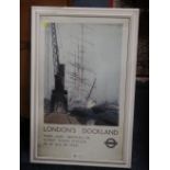 A VINTAGE STYLE FRAMED LONDON DOCKLANDS POSTER