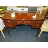 AN ANTIQUE MAHOGANY BOW-FRONTED DESK WITH FOUR DRAWERS W-106 CM
