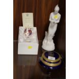 A BOXED ROYAL CROWN DERBY CERAMIC EGG WITH STAND, TOGETHER WITH A ROYAL DOULTON FIGURINE ETC (3)