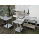 FOUR ASSORTED STAINLESS STEEL CATERING TABLES