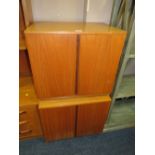 A PAIR OF MID-CENTURY TEAK MUSIC CABINETS (2)