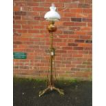 A VICTORIAN BRASS LAMP STANDARD WITH SHADE