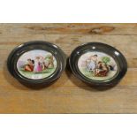 A PAIR OF AUSTRIAN STYLE CABINET PLATES DECORATED WITH CLASSICAL SCENES