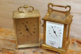 A BRASS CASED COTTRILLS MODERN CARRIAGE CLOCK TOGETHER WITH A SWIZA 8 DAY EXAMPLE (2)