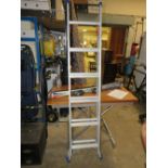A PAIR OF FOLDING ALLOY STEPS/LADDERS