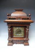 A LATE 19TH CENTURY MAHOGANY BRACKET CLOCK BY R M SCHNEKENBURGER, of architectural outline, the case