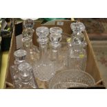 A TRAY OF ASSORTED CUT GLASS DECANTERS ETC