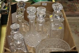 A TRAY OF ASSORTED CUT GLASS DECANTERS ETC