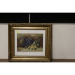 A GILT FRAMED AND GLAZED OIL ON BOARD STILL LIFE STUDY OF FRUIT AND FLOWERS, INDISTINCTLY SIGNED