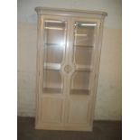 A FRENCH STYLE MODERN DISPLAY CABINET