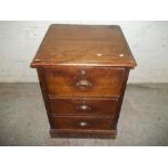 AN ANTIQUE CHEST OF DRAWERS