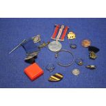 A COLLECTION OF COSTUME JEWELLERY, MEDALS AND BADGES