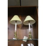 A PAIR OF BRASS TABLE LAMPS