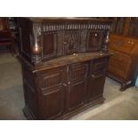 AN OAK COURT CUPBOARD