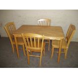 A MODERN KITCHEN TABLE AND A SET OF 4 CHAIRS