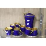 A DECORATIVE BLUE PAINTED CROWN DEVON COFFEE SET