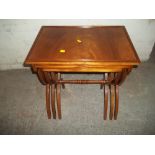 A MAHOGANY NEST OF THREE TABLES