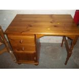 A SOLID PINE DRESSING TABLE