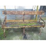 AN ANTIQUE CAST AND WOOD GARDEN BENCH