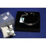 A BOXED WRIST WATCH TOGETHER WITH A BOXED NECKLACE