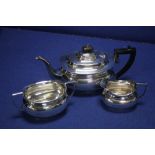 A HALL MARKED SILVER THREE PIECE TEA SET