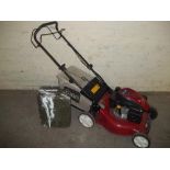 A TORO PETROL MOWER AND PETROL CAN