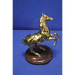 A BRASS FIGURE OF A HORSE