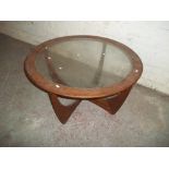 A RETRO TEAK AND GLASS COFFEE TABLE IN G PLAN STYLE