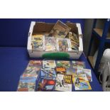 A COLLECTION OF BOOKS AND COMICS, to include Commando, battle etc