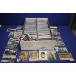 TWO TRAYS OF ASSORTED POSTCARDS IN MANY HUNDREDS, to include vintage examples from the early 1900s