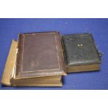 TWO VICTORIAN LEATHER BOUND PHOTO ALBUMS WITH CLASPS, containing a quantity of Cartes De Visites/