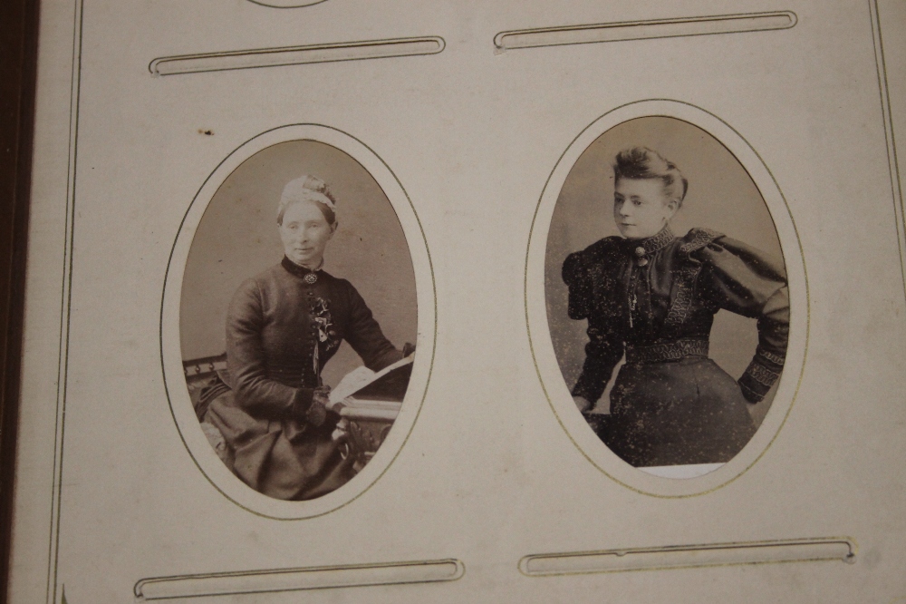 AN ALBUM OF CABINET CARDS, to include portrait photographs examples by Grahams Art Studio - Image 2 of 8