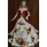 A BOXED ROYAL ALBERT FIGURINE - OLD COUNTRY ROSE