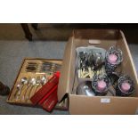 A BOX AND A TRAY OF METALWARE TO INCLUDE AN OLD HALL STAINLESS STEEL TEASET, QUANTITY OF FLATWARE