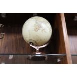 A CONTEMPORARY STYLE TABLE TOP GLOBE