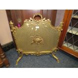 A LOUIS XV STYLE BRASS FIRESCREEN H-74 W-72 CM