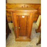 AN EDWARDIAN OAK POT CUPBOARD