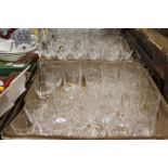 TWO TRAYS OF ASSORTED GLASSWARE MAINLY DRINKING GLASSES, TO INCLUDE CUT GLASS EXAMPLES, TWO VASES