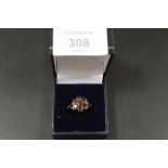 A HALLMARKED 9CT GOLD GARNET RING A/F - APPROX WEIGHT 3.5 G