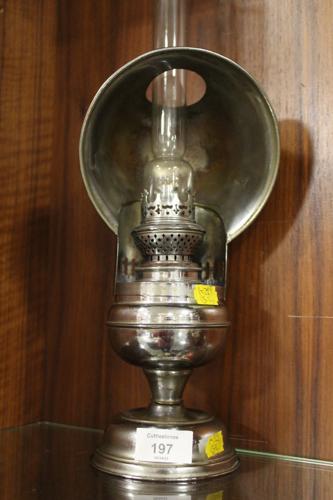 A 20TH CENTURY STORM LAMP WITH COWL