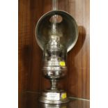 A 20TH CENTURY STORM LAMP WITH COWL