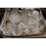 A TRAY OF ASSORTED CUT GLASS TO INCLUDE VANITY JARS, DRINKING GLASSES, ETC