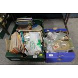 TWO TRAYS OF ASSORTED EPHEMERA TO INCLUDE TEACARDS, FIRST DAY COVERS, VINTAGE BOOKS, MAPS,