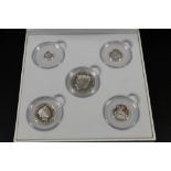 A CASED SET OF SIX SILVER COINS BY SILVER SOVEREIGN