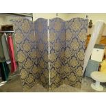 AN UPHOLSTERED FOUR FOLD DRESSING SCREEN