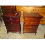 A PAIR OF STAG MINSTREL FOUR DRAWER BEDROOM CHESTS
