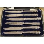 A CASED SET OF HALLMARKED SILVER HANDLED KNIVES