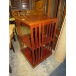 A MAHOGANY INLAID REVOLVING BOOKCASE