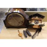 A VINTAGE WALL MOUNTED CUCKOO CLOCK TOGETHER WITH A VINTAGE MANTLE CLOCK (2)