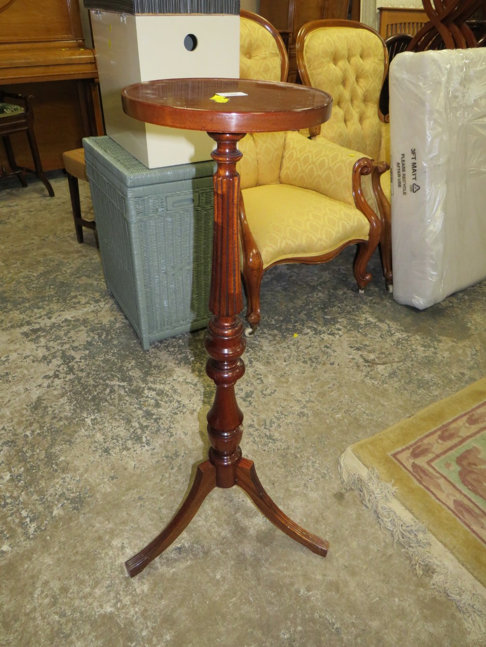 A REPRODUCTION MAHOGANY TORCHERE